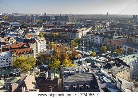 MUNICH, GERMANY - OCTOBER 31, 2015: Aerial view on the at the Viktualienmarkt a typical farmers market in the inner city of Munich