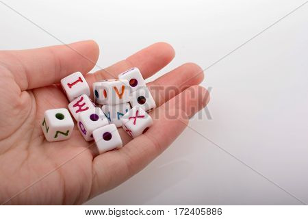 Colorful Alphabet Letter Cubes In Hand