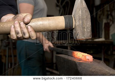 hands at work in blacksmithy