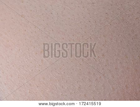 Texture of young woman's skin closeup shooting