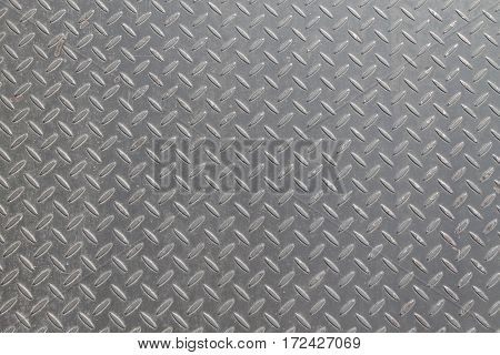 a metal background or texture with tread plate pattern