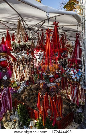 Sales stall offering decorated fire cones at the Viktualienmarkt in Munich