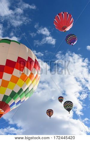 Hot Air Balloons lifting off at the Snowdown balloon festival in Durango Colorado