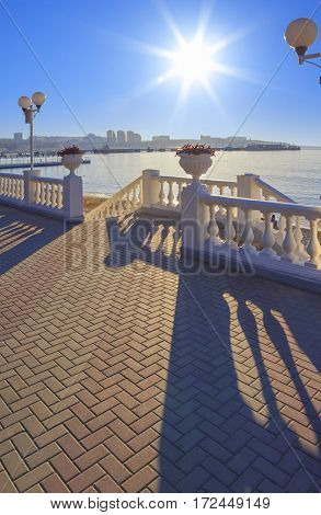 Sunny day on the black sea waterfront. Place for walks and rest. Black sea Gelendzhik.