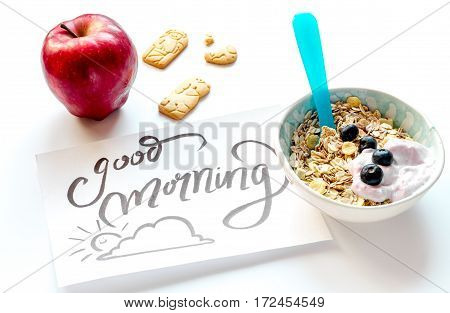 concept kid breakfast with muesli on white background.