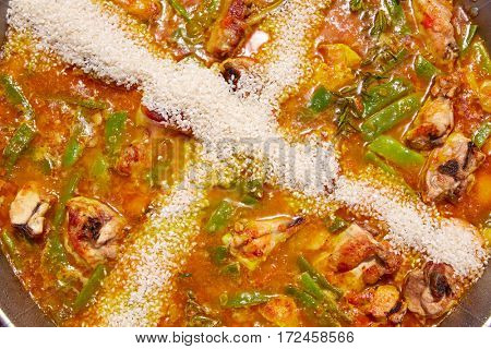 Paella from Spain recipe process ad the rice step by step
