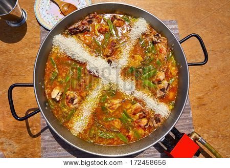 Paella from Spain recipe process ad the rice step by step