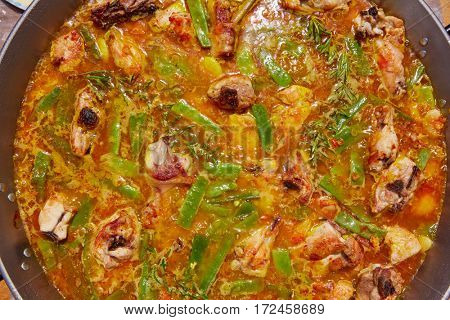Paella from Spain recipe process boiling broth step by step