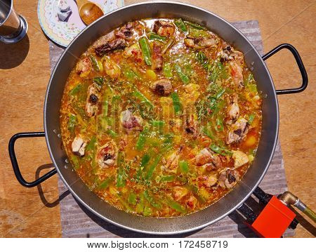 Paella from Spain recipe process boiling broth step by step
