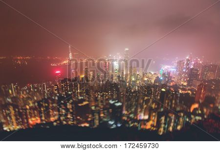 Beautiful super wide-angle summer aerial view View of Hong Kong island skyline, Victoria Bay harbor, with skyscrapers, blue sky and scenery beyond the city, seen from Kowloon island observation Deck
