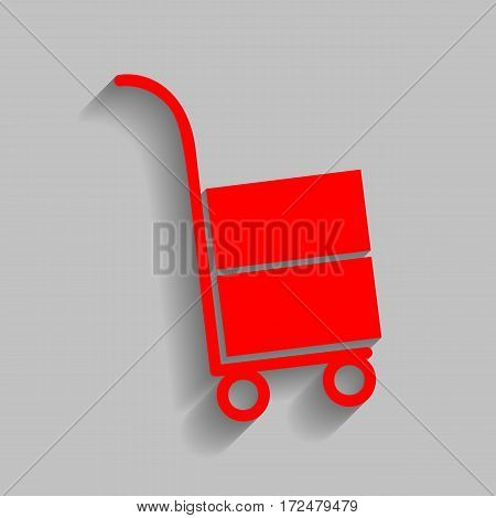 Hand truck sign. Vector. Red icon with soft shadow on gray background.