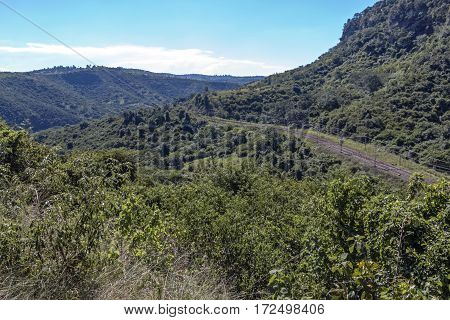 Rural Railway Track Running Through Hills And Valleys