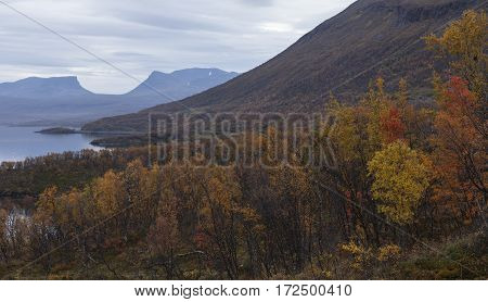 Nordic mountains in overcast weather, autumn fall. Well known landmark in northern Sweden along the road Narvik - Kiruna.