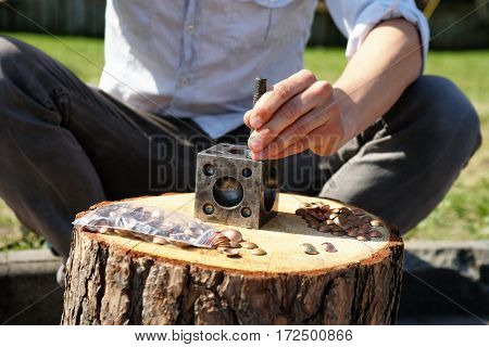 Outdoor photography of a minter at work