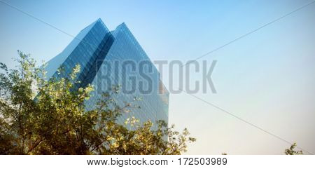Low angle view of buildings against clear sky blur