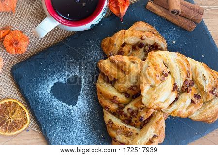 marple and pecan plait pastry sweet food breakfast with heart sign and tea cup