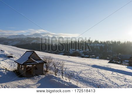 Winter mountains covered with snow view from a big meadow in Tatry mountains in Poland