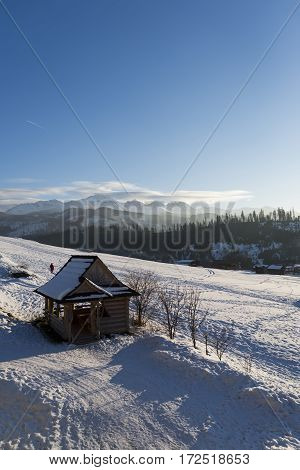 Winter mountains covered with snow view from a big meadow in Tatry mountains in Poland