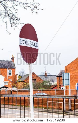 Property For Sale Text banner and sign over houses background in UK.