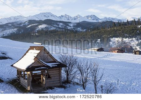 Winter mountains covered with snow view from a big meadow in Tatry mountains in Poland