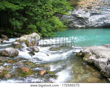 The Bystry mountain river with blue water