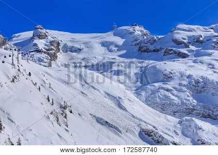 Wintertime view on Mt. Titlis in Switzerland. The Titlis is a mountain, located on the border between the Swiss cantons of Obwalden and Bern.