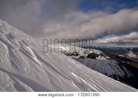 Winter landscape of mountains. Snow-bound mountain landscape. Mountain landscape.