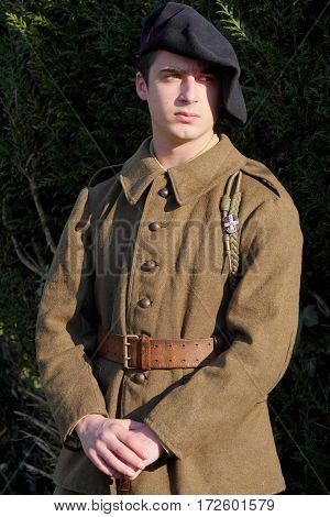a french soldier in 1940's uniform outdoor
