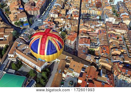 Hot air balloon flight over the city Vic. Spain