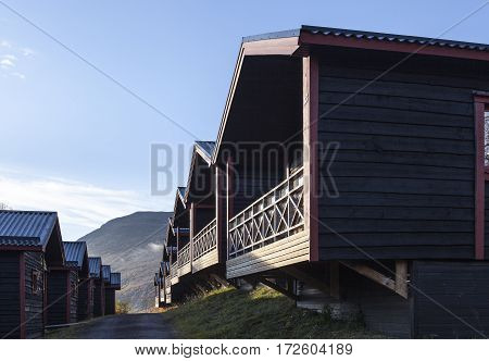 LAPLAND, SWEDEN ON SEPTEMBER 21. Modern, wooden cabin, lodge close to the Hotel Fjallet on September 21, 2016 in Lapland, Sweden. Sunny morning in the autumn, fall. Editorial use.