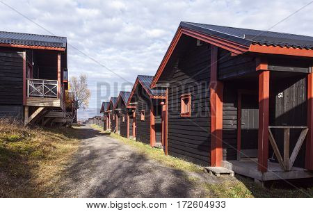 LAPLAND, SWEDEN ON SEPTEMBER 21. Modern, wooden cabin, lodge close to the Hotel Fjallet on September 21, 2016 in Lapland, Sweden. Sunny morning in the autumn, fall. Editorial use.