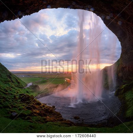 Sunrise on Seljalandfoss waterfall on Seljalandsa river, Iceland, Europe.