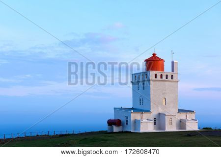 White lighthouse at Cape Dyrholaey, Iceland.