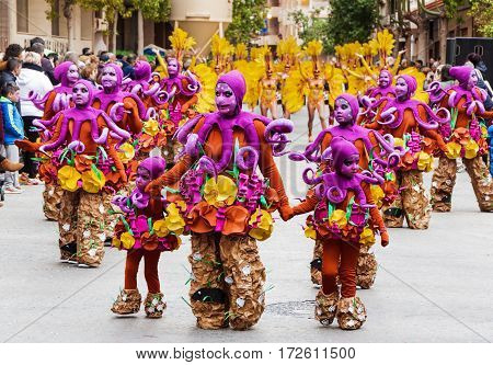 Carnival groups and costumed characters parade through the streets of the city. FEBRUARY 19 2017 Torrevieja Spain.
