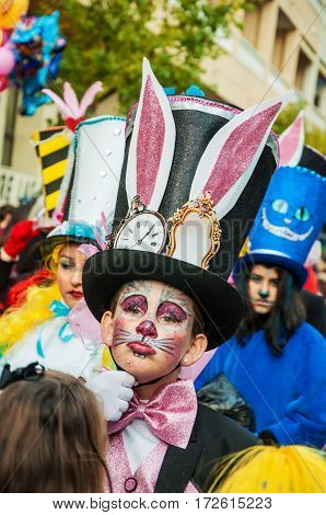 Portrait of kid at parade costumed characters through the streets of the city. FEBRUARY 17 2015 Torrevieja Spain.