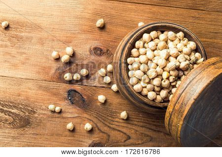 Portion of Chick Peas in wooden bowl.
