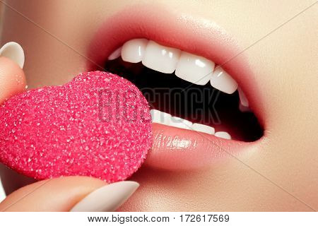 Heart Shape Candy In Pretty Pink Lips. Perfect Lip Makeup Healthy Smile. Teeth Whitening. Dental Hea