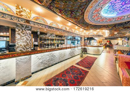 MOSCOW - AUGUST 2014: Interior Chaihana Lounge Eastern restaurant in a traditional style. The main hall with bar and open kitchen