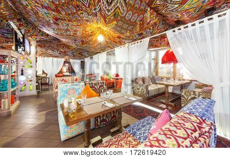 MOSCOW - AUGUST 2014: Interior Chaihana Lounge Eastern restaurant in a traditional style. The main hall with dedicated places in oriental style