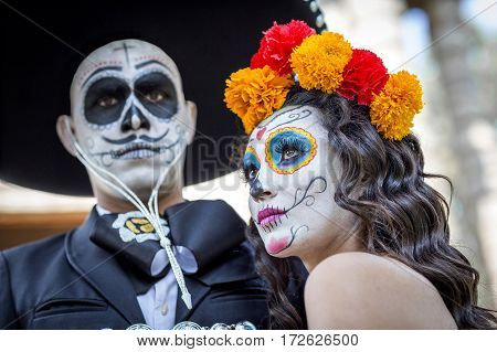 Bridal Couple With Makeup And Costumes Typical Mexican In A Cementery.