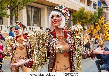 Portrait of young girl at parade costumed characters through the streets of the city. FEBRUARY 19 2017 Torrevieja Spain.