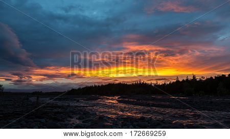 Beautiful sunset on the river Studenaya. Kamchatka Peninsula.