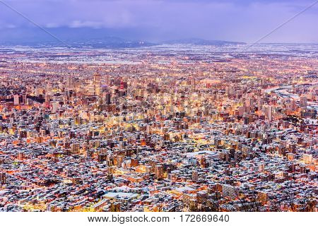 Sapporo, Japan aerial cityscape in winter at twilight.