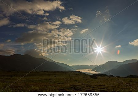 Sunrise in the brookvalley Spokoyny at the foot of outer north-eastern slope of caldera volcano Gorely.