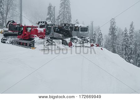 Sochi, Russia - January 21, 2017: Snow grooming on slope of ski resort Gorky Gorod