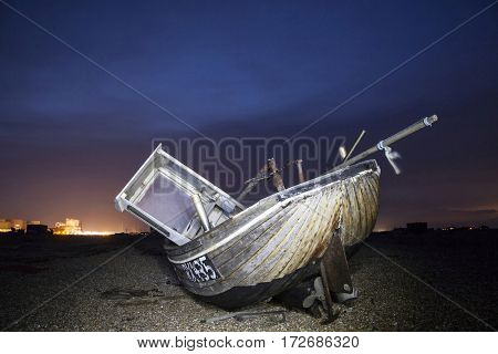 Shipwreck in the dusk on England`s coastline