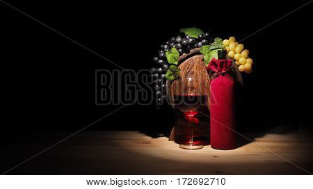 Glass Of Wine And Barrel On Wooden Table