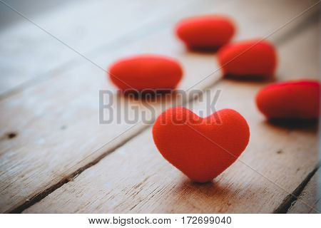 Heart on wooden board with copy space close up.Valentines Day background concept Wedding day.Vintage tone