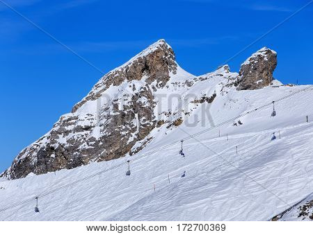 Wintertime view from Mt. Titlis in Switzerland. The Titlis is a mountain, located on the border between the Swiss cantons of Obwalden and Bern.