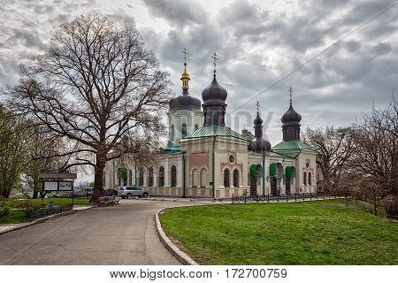 Orthodox Church of Kiev In the botanical garden crosses tend to heaven around trees blossom
